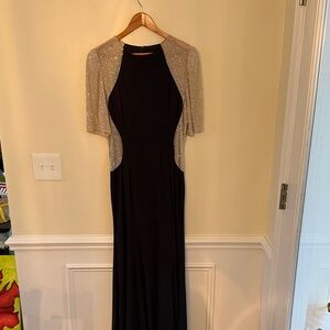 Xscape Black gown with Silver beaded sleeves